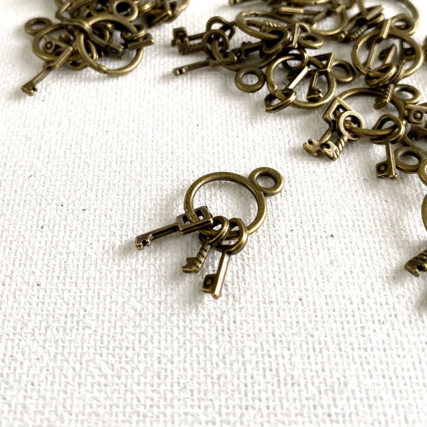 Tiny key charms Dollhouse miniatures Antique bronze Miniature key pendants - Blacksparrowuk