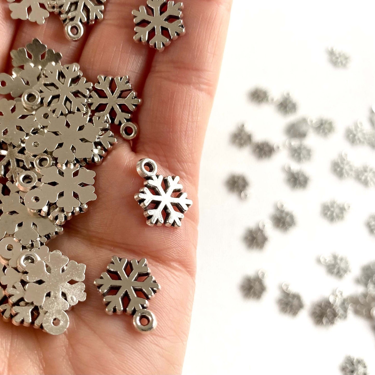 Tiny Silver Snowflake charms Zinc Alloy metal Festive Icicle Christmas pendants - Blacksparrowuk