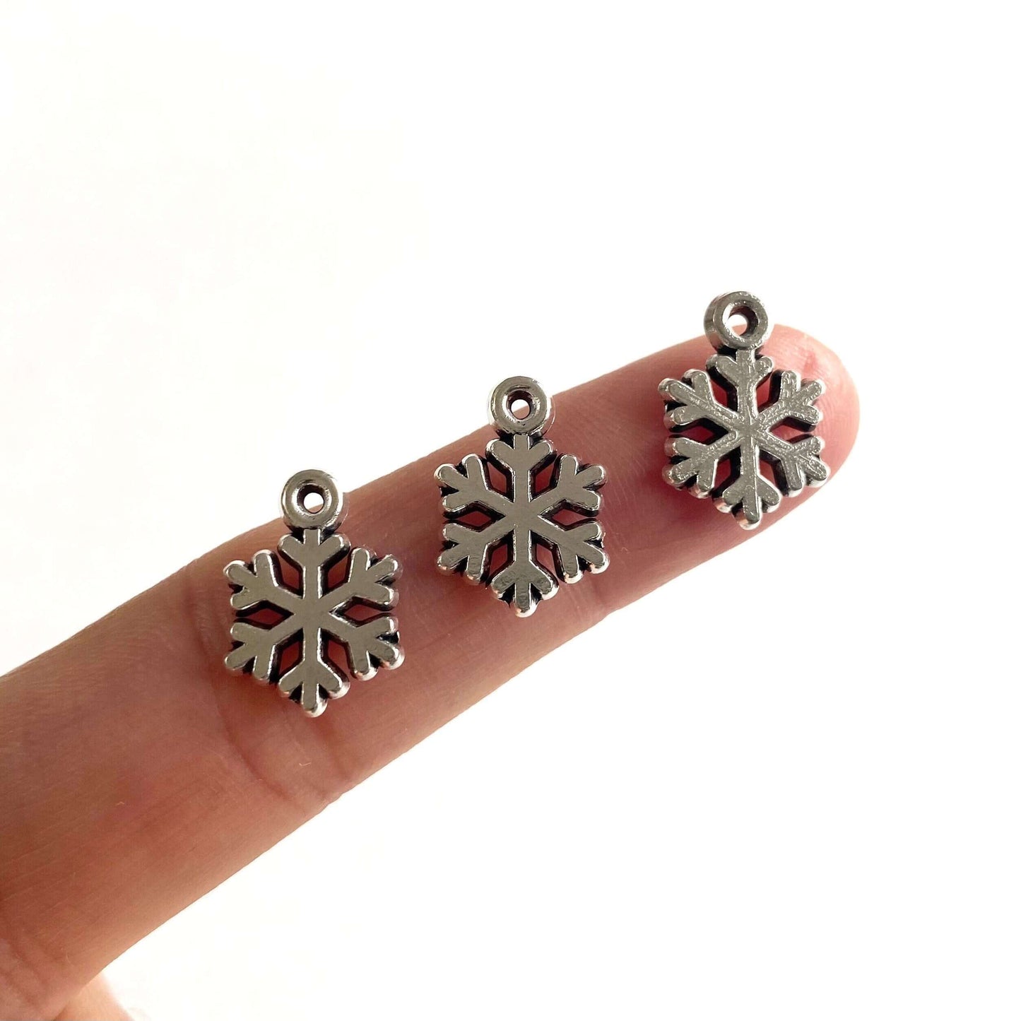 Tiny Silver Snowflake charms Zinc Alloy metal Festive Icicle Christmas pendants - Blacksparrowuk