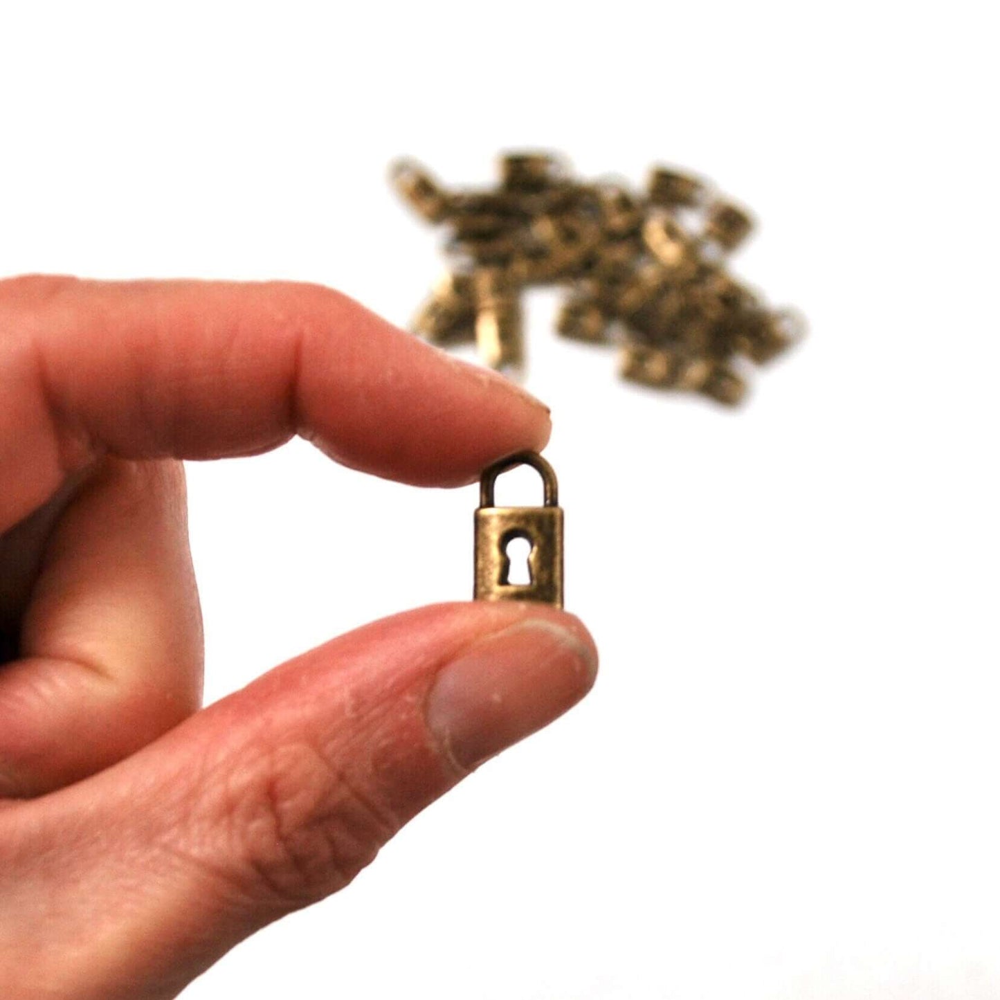 Mini padlock charm 8mm UK Small bronze pendant jewellery fastening - Blacksparrowuk